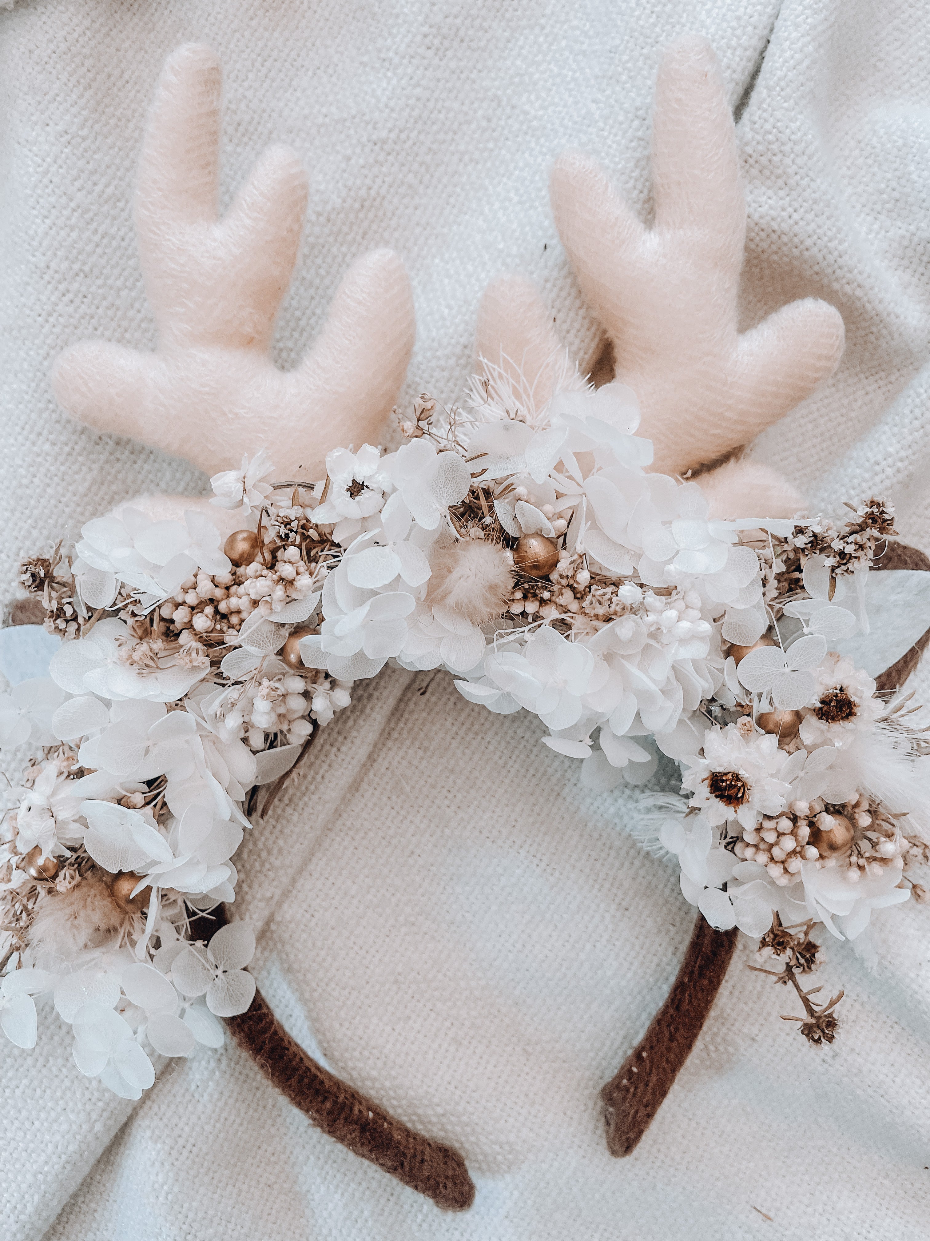 Floral boho reindeer headband.